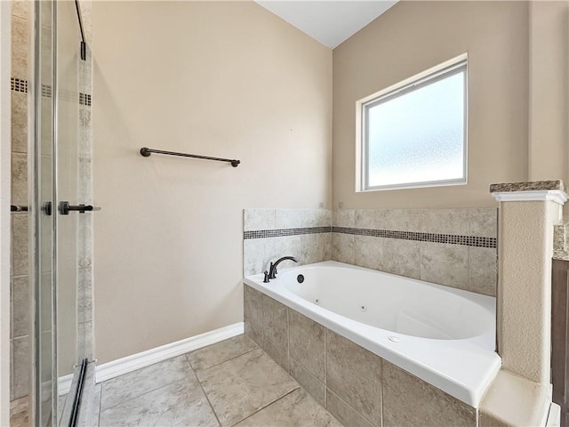 bathroom with tile patterned floors and plus walk in shower