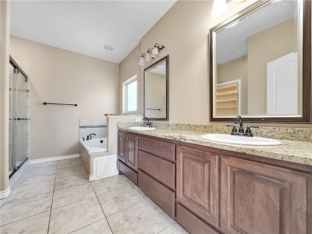 bathroom featuring vanity, separate shower and tub, and tile patterned floors