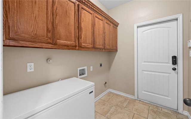 laundry room with cabinets, hookup for a washing machine, hookup for a gas dryer, and hookup for an electric dryer