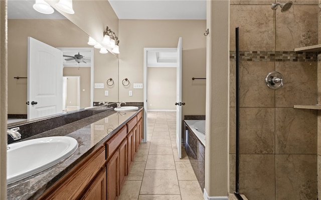 bathroom with ceiling fan, vanity, shower with separate bathtub, and tile patterned floors