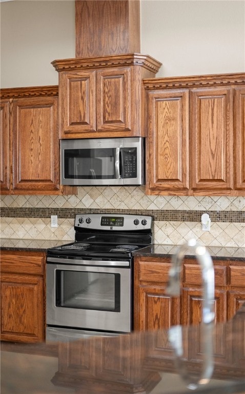 kitchen featuring backsplash and appliances with stainless steel finishes