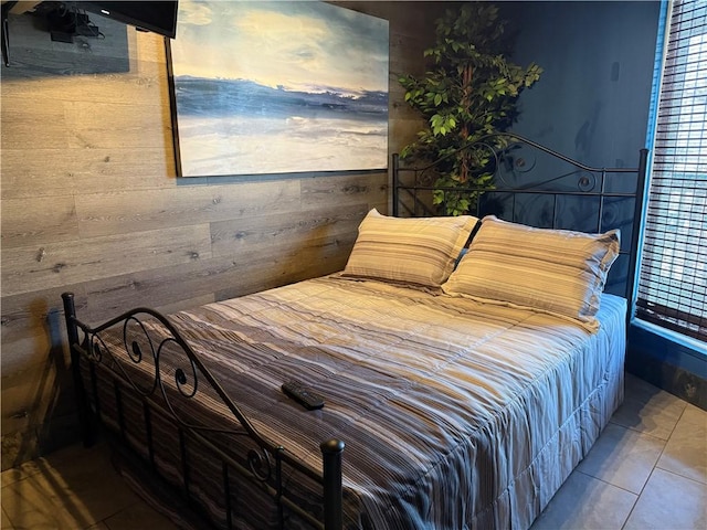 bedroom featuring tile patterned flooring