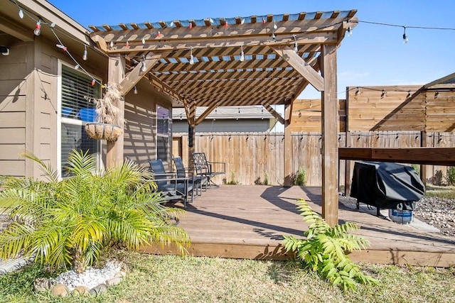 view of patio / terrace featuring a pergola, a deck, and grilling area