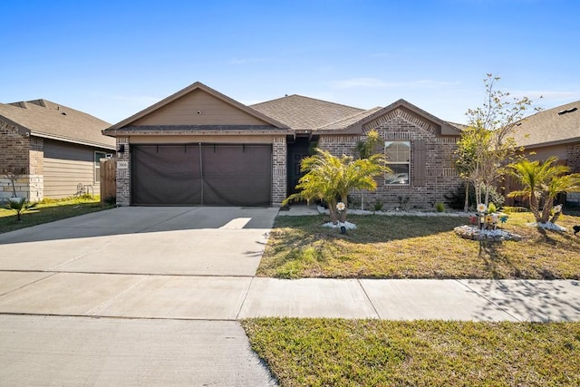 single story home featuring a front yard and a garage