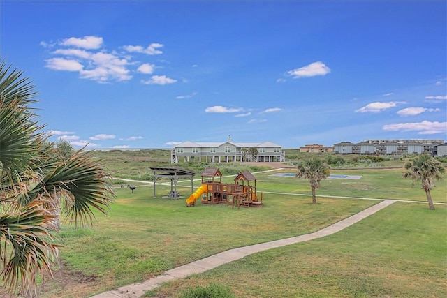 view of playground with a yard