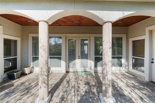 deck with a patio area and french doors