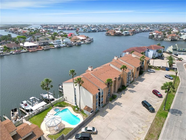 aerial view with a water view and a residential view