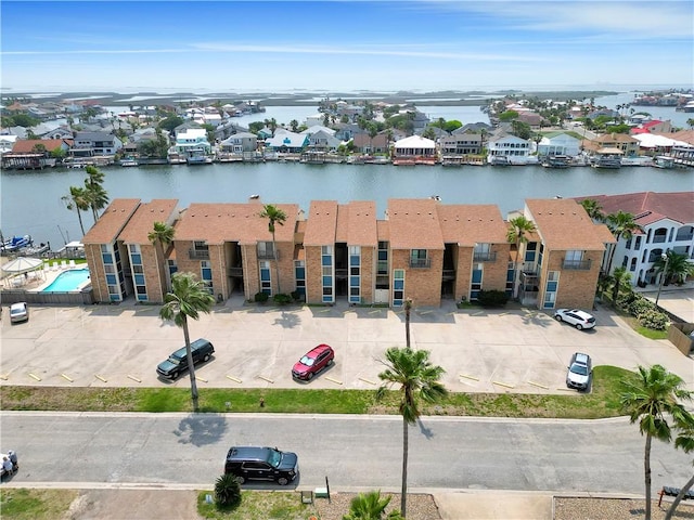 aerial view with a residential view and a water view