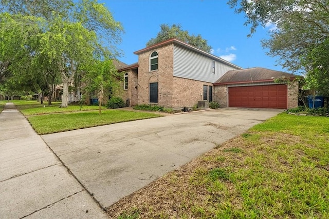 4537 Silver Hollow Dr, Corpus Christi, TX 78413 - view of side of home featuring brick siding, concrete driveway, a lawn, and a garage