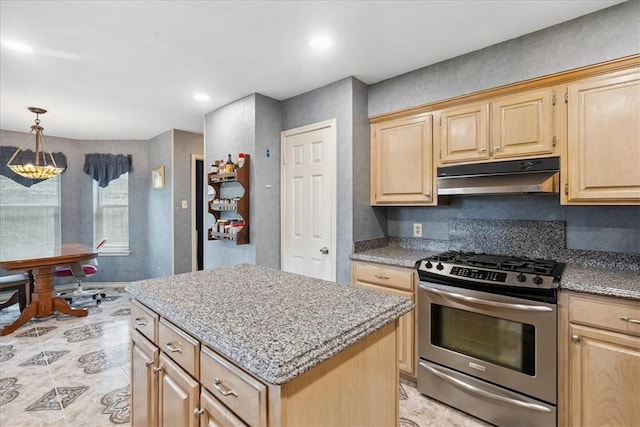 4537 Silver Hollow Dr, Corpus Christi, TX 78413 - kitchen with gas stove, under cabinet range hood, light brown cabinetry, a kitchen island, and recessed lighting