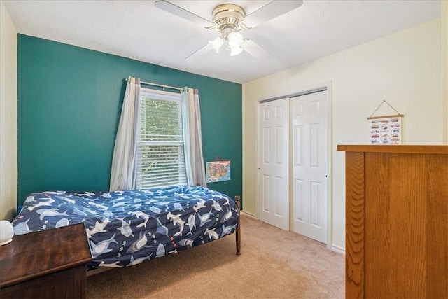 4537 Silver Hollow Dr, Corpus Christi, TX 78413 - bedroom with light carpet, a closet, and ceiling fan