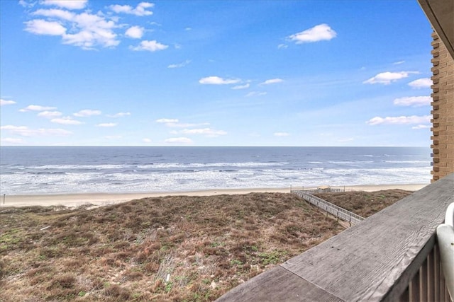 view of water feature with a beach view