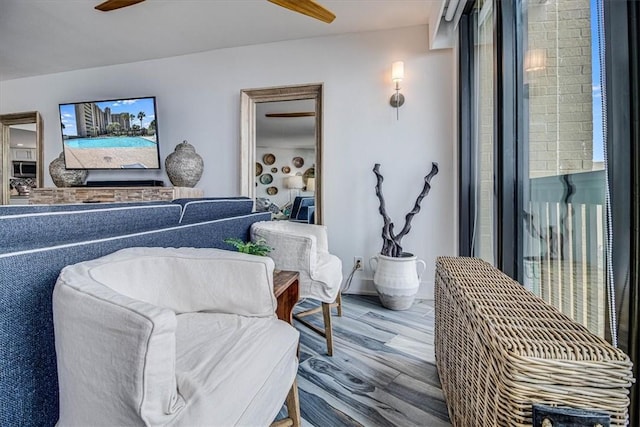 interior space featuring ceiling fan and wood finished floors