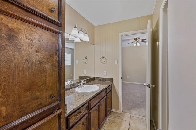 bathroom featuring tile patterned flooring, vanity, and ceiling fan