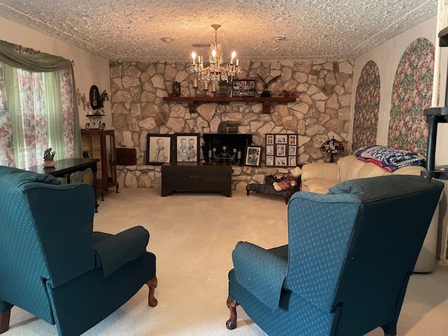 living room featuring carpet flooring, a textured ceiling, and an inviting chandelier