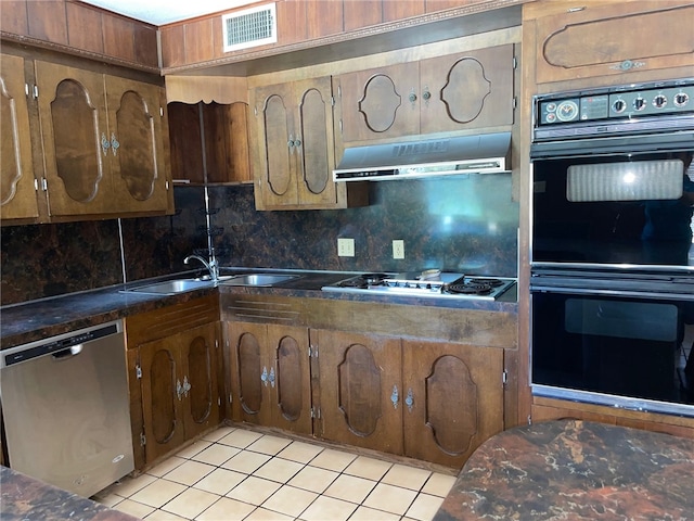 kitchen featuring sink, tasteful backsplash, gas cooktop, stainless steel dishwasher, and black double oven