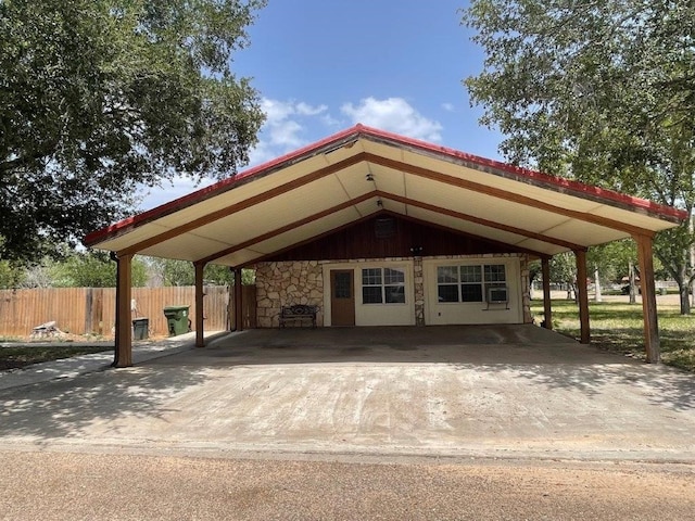 exterior space with a carport