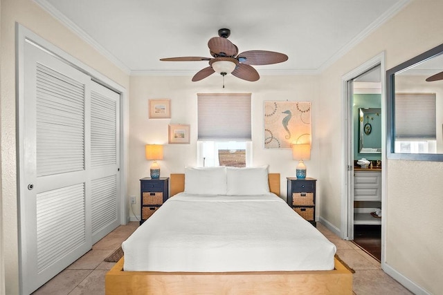 bedroom with ceiling fan, a closet, light tile patterned flooring, and ornamental molding