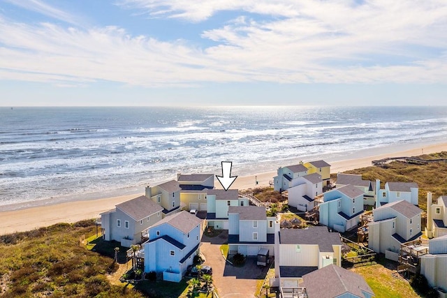 drone / aerial view with a view of the beach and a water view