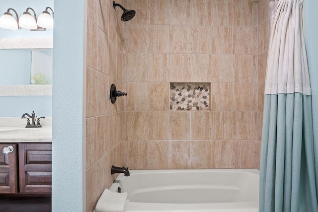 bathroom with vanity and shower / bath combo with shower curtain