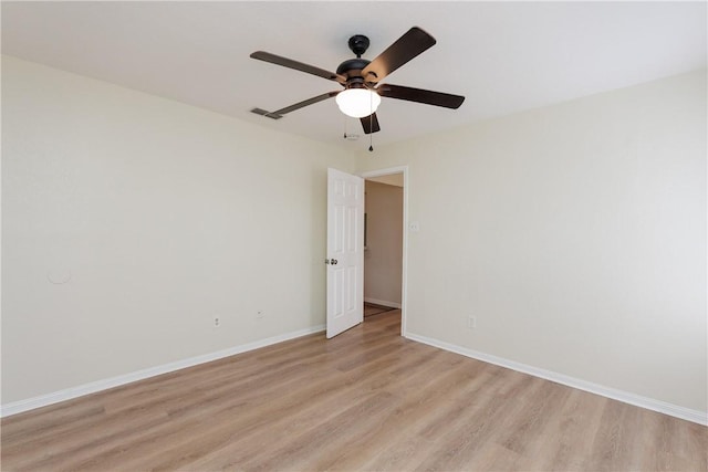 6117 Camwood Dr, Corpus Christi, TX 78415 - unfurnished room featuring light wood finished floors, a ceiling fan, and baseboards