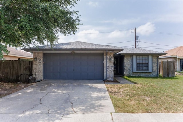 6117 Camwood Dr, Corpus Christi, TX 78415 - view of front of property featuring an attached garage, driveway, and brick siding
