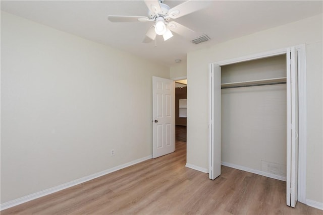 6117 Camwood Dr, Corpus Christi, TX 78415 - unfurnished bedroom with light wood-style flooring, a closet, baseboards, and a ceiling fan