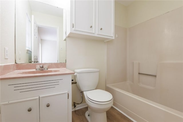 6117 Camwood Dr, Corpus Christi, TX 78415 - bathroom with toilet, vanity, and shower / tub combination