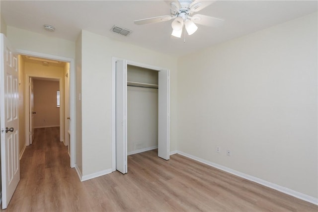 6117 Camwood Dr, Corpus Christi, TX 78415 - unfurnished bedroom with light wood-style flooring, baseboards, a closet, and ceiling fan