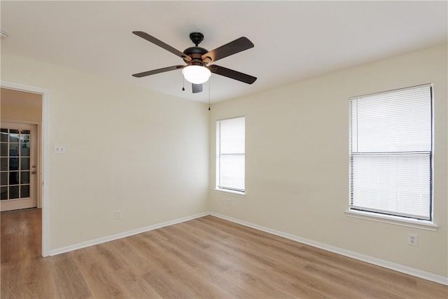 6117 Camwood Dr, Corpus Christi, TX 78415 - spare room with light wood-style floors, a ceiling fan, and baseboards