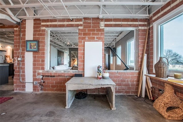 misc room with concrete flooring