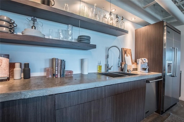 kitchen featuring stainless steel dishwasher and sink