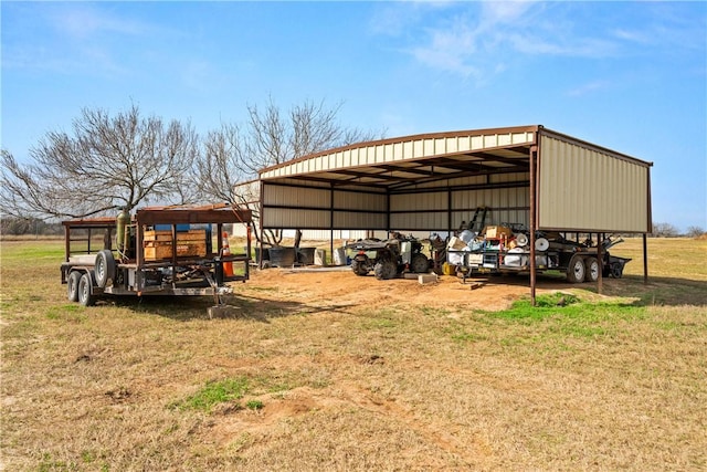 view of outbuilding with a yard