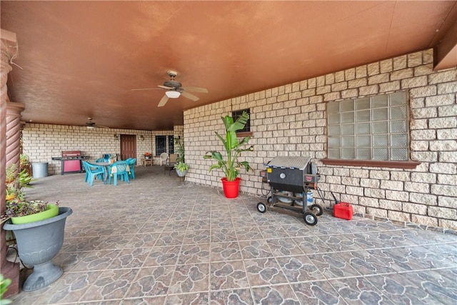 view of patio with ceiling fan