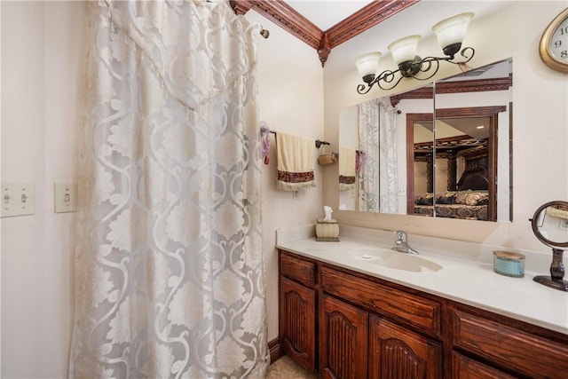 bathroom with vanity and crown molding