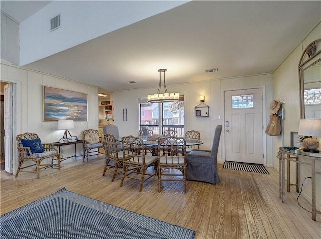 dining area with light hardwood / wood-style floors