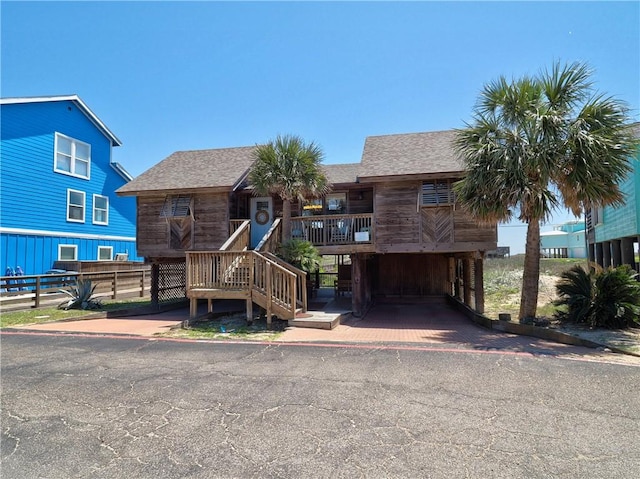 view of front of home with a carport