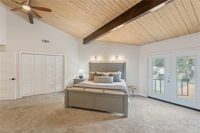 carpeted bedroom featuring lofted ceiling with beams, access to outside, french doors, wood ceiling, and ceiling fan