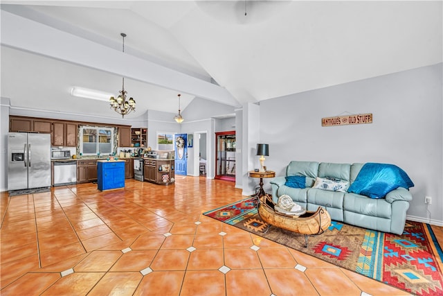 tiled living room featuring high vaulted ceiling and a notable chandelier