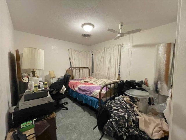 1318 Meadowlane Dr, Corpus Christi, TX 78412 - carpeted bedroom featuring a textured ceiling and a ceiling fan