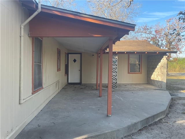 104 E Refugio St, Skidmore, TX 78389 - view of patio with a carport