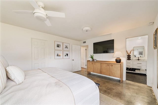 934 Miramar Pl, Corpus Christi, TX 78411 - bedroom with finished concrete flooring, ceiling fan, and ensuite bathroom