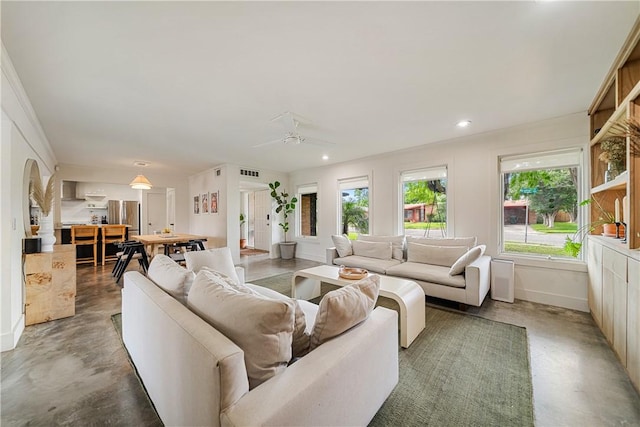 934 Miramar Pl, Corpus Christi, TX 78411 - living area featuring finished concrete floors, baseboards, a ceiling fan, and recessed lighting