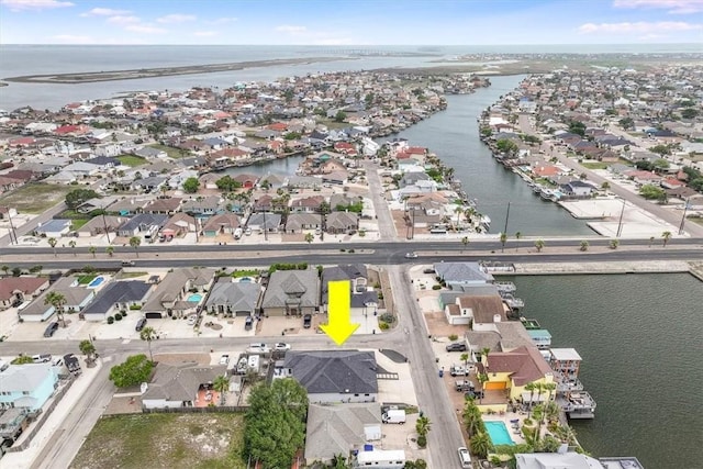 aerial view with a residential view and a water view