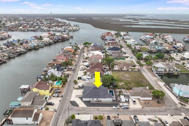 aerial view featuring a residential view and a water view