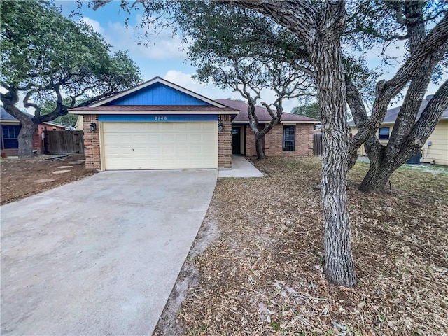 single story home featuring a garage