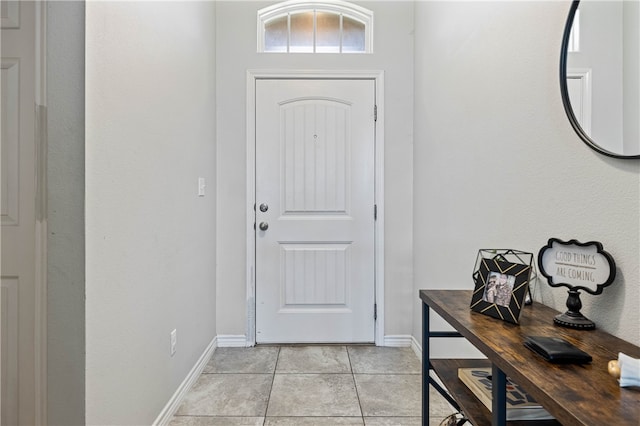 entryway featuring light tile patterned flooring