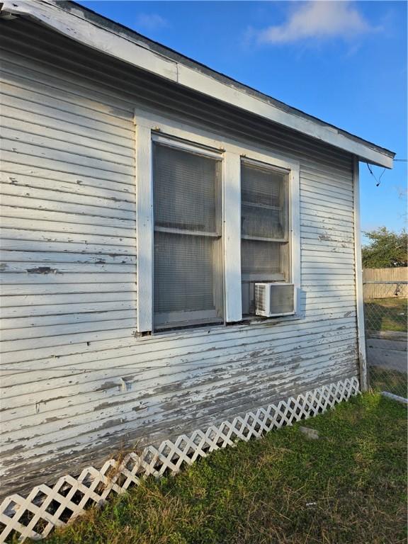 view of home's exterior featuring cooling unit