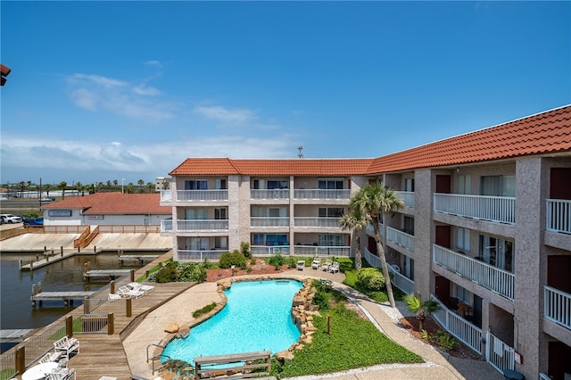 view of swimming pool with a patio area