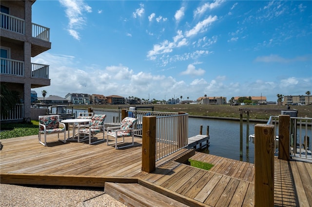 dock area with a water view